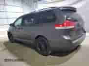 2012 Toyota Sienna XLE with VIN 5TDDK3DC9CS033551, listed as a Copart auction lot 69910445 with 210,288 mi miles and Salvage title. Bid and sale history available at DreamBid. Image 2.