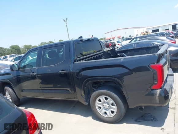 2022 Toyota Tundra SR with VIN 5TFKB5AB7NX017988, listed as a IAAI auction lot 42986871 with 50,437 mi miles and . Bid and sale history available at DreamBid. Image 14.