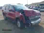 2011 Chevrolet Tahoe LT z VIN 1GNSKBE02BR310230, wystawiony jako IAAI lot #42703227 z przebiegiem 175 986 mil mil oraz . Historia ofert i sprzedaży dostępna na DreamBid. Obrazek 1.