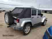 2007 Jeep Wrangler Unlimited Sahara z VIN 1J4GA59167L212909, wystawiony jako Copart lot #82455775 z przebiegiem 124 148 mil mil oraz Czysty tytuł • Clean title. Historia ofert i sprzedaży dostępna na DreamBid. Obrazek 3.