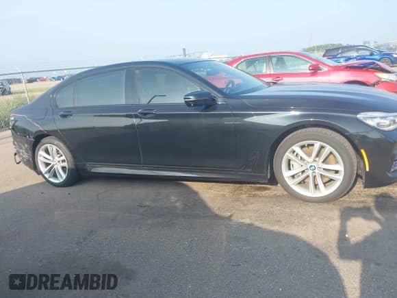 2017 BMW 7 Series ALPINA B7 xDrive with VIN WBA7F2C55HG421227, listed as a IAAI auction lot 42811801 with 96,969 mi miles and . Bid and sale history available at DreamBid. Image 13.