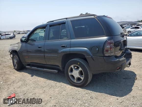 2005 Chevrolet TrailBlazer LT z VIN 1GNDS13S252325377, wystawiony jako Copart lot #64788165 z przebiegiem Nie podano mil oraz Szkoda całkowita • Salvage title. Historia ofert i sprzedaży dostępna na DreamBid. Obrazek 2.