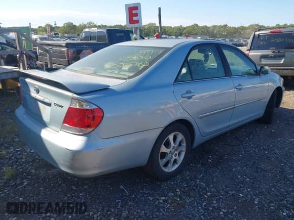 2005 Toyota Camry LE with VIN 4T1BF30K45U599118, listed as a IAAI auction lot 43154828 with Not provided miles and . Bid and sale history available at DreamBid. Image 4.