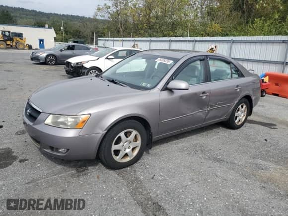 2006 Hyundai Sonata GLS z VIN KMHEU46C56A145715, wystawiony jako Copart lot #85309335 z przebiegiem 91 320 mil mil oraz Szkoda całkowita • Salvage title. Historia ofert i sprzedaży dostępna na DreamBid. Obrazek 1.