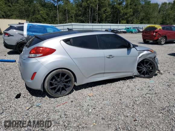 2016 Hyundai Veloster with VIN KMHTC6AD0GU273916, listed as a Copart auction lot 80537395 with 106,568 mi miles and Salvage title. Bid and sale history available at DreamBid. Image 3.