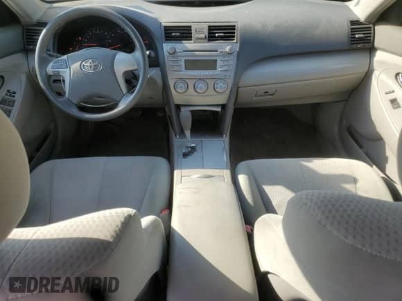 2010 Toyota Camry LE с VIN 4T4BF3EK5AR087148, выставлен на аукционе Copart как лот 85102705 с пробегом 142 240 миль миль и Списание • Salvage title. История ставок и продаж доступна на DreamBid. Изображение 8.