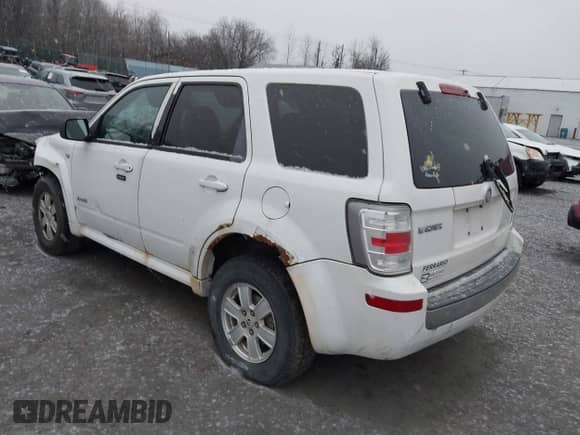 2008 Mercury Mariner with VIN 4M2CU91128KJ03668, listed as a IAAI auction lot 41213830 with 240,480 mi miles and . Bid and sale history available at DreamBid. Image 3.