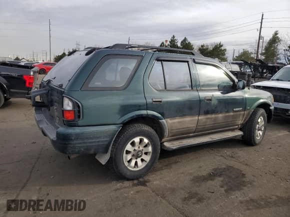 2000 Honda Passport LX с VIN 4S6DM58W0Y4406220, выставлен на аукционе Copart как лот 82774694 с пробегом 171 487 миль миль и Списание • Salvage title. История ставок и продаж доступна на DreamBid. Изображение 3.
