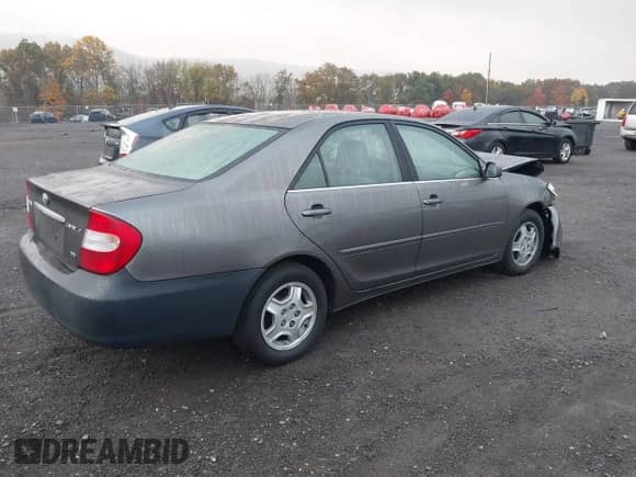 2003 Toyota Camry LE with VIN 4T1BF32K43U562869, listed as a IAAI auction lot 43506255 with 121,868 mi miles and . Bid and sale history available at DreamBid. Image 4.
