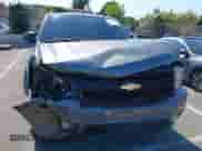 2007 Chevrolet Tahoe LT with VIN 1GNFC13037J393944, listed as a IAAI auction lot 42750350 with 180,474 mi miles and . Bid and sale history available at DreamBid. Image 6.