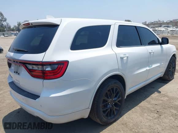 2015 Dodge Durango SXT with VIN 1C4RDHAG4FC201414, listed as a IAAI auction lot 42735352 with 136,207 mi miles and . Bid and sale history available at DreamBid. Image 4.