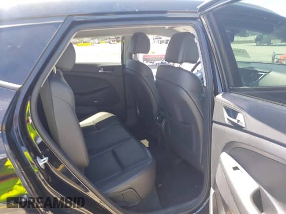 2018 Hyundai Tucson SEL z VIN KM8J3CA43JU736032, wystawiony jako IAAI lot #42025713 z przebiegiem 69 636 mil mil oraz . Historia ofert i sprzedaży dostępna na DreamBid. Obrazek 8.