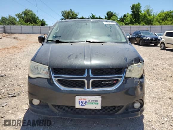2013 Dodge Grand Caravan Crew with VIN 2C4RDGDG2DR700268, listed as a Copart auction lot 57086795 with 154,006 mi miles and Salvage title. Bid and sale history available at DreamBid. Image 5.
