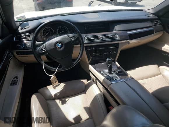 2011 BMW 7 Series with VIN WBAKX8C59BC198179, listed as a Copart auction lot 52796825 with 123,725 mi miles and Salvage title. Bid and sale history available at DreamBid. Image 8.