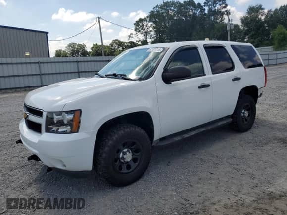 2013 Chevrolet Tahoe Commercial с VIN 1GNSK2E04DR343846, выставлен на аукционе Copart как лот 67101715 с пробегом 127 672 миль миль и Списание • Salvage title. История ставок и продаж доступна на DreamBid. Изображение 1.