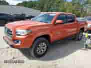2016 Toyota Tacoma SR5 z VIN 5TFAZ5CN1GX004509, wystawiony jako Copart lot #84719715 z przebiegiem 123 742 mil mil oraz Szkoda całkowita • Salvage title. Historia ofert i sprzedaży dostępna na DreamBid. Obrazek 1.