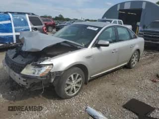 2008 Ford Taurus SEL with VIN 1FAHP24W98G141103, listed as a Copart auction lot 67917285 with 143,320 mi miles and Salvage title. Bid and sale history available at DreamBid. Image 1.