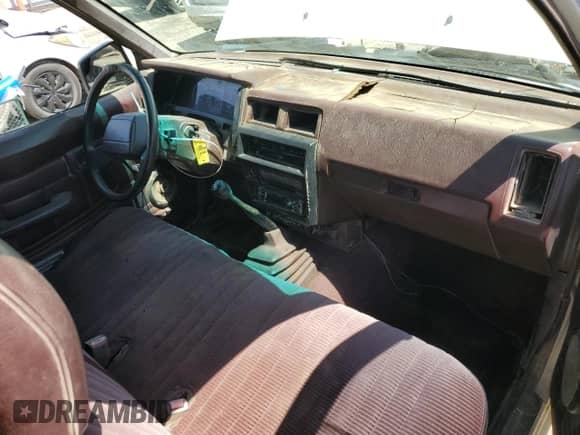 1992 Nissan Frontier XE with VIN 1N6SD11S5NC351492, listed as a Copart auction lot 69573075 with 245,280 mi miles and Salvage title. Bid and sale history available at DreamBid. Image 8.
