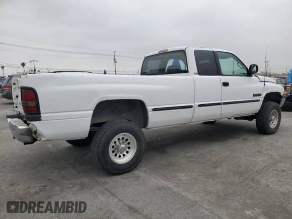 1998 Dodge 2500 с VIN 3B7KF22D7WG138206, выставлен на аукционе Copart как лот 53313395 с пробегом 333 521 миль миль и Списание • Salvage title. История ставок и продаж доступна на DreamBid. Изображение 3.