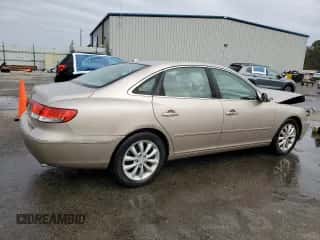 2007 Hyundai Azera SE z VIN KMHFC46F87A236075, wystawiony jako Copart lot #86441814 z przebiegiem 120 287 mil mil oraz Szkoda całkowita • Salvage title. Historia ofert i sprzedaży dostępna na DreamBid. Obrazek 3.