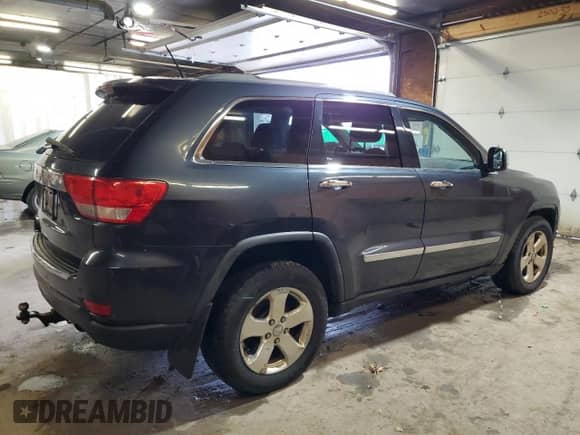2012 Jeep Grand Cherokee Limited z VIN 1C4RJFBT4CC264632, wystawiony jako Copart lot #90137105 z przebiegiem 214 018 mil mil oraz Czysty tytuł • Clean title. Historia ofert i sprzedaży dostępna na DreamBid. Obrazek 3.