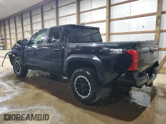 2024 Toyota Tacoma TRD Off Road with VIN 3TMLB5JN8RM005102, listed as a Copart auction lot 89516175 with 22,558 mi miles and Salvage title. Bid and sale history available at DreamBid. Image 2.