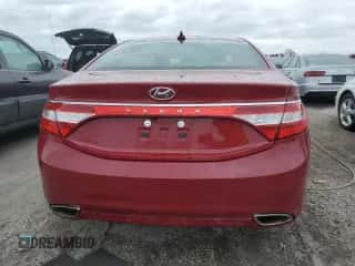 2014 Hyundai Azera z VIN KMHFG4JG1EA411560, wystawiony jako Copart lot #75545444 z przebiegiem 66 322 mil mil oraz Nie do naprawy • Non repairable. Historia ofert i sprzedaży dostępna na DreamBid. Obrazek 6.