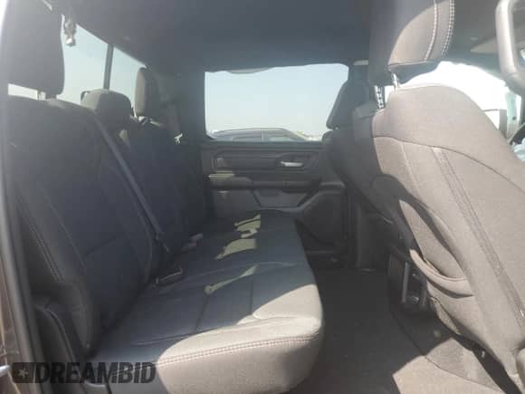 2025 Ram 1500 Tradesman with VIN 1C6RRFGG0SN646400, listed as a Copart auction lot 65794815 with 9,838 mi miles and Salvage title. Bid and sale history available at DreamBid. Image 10.