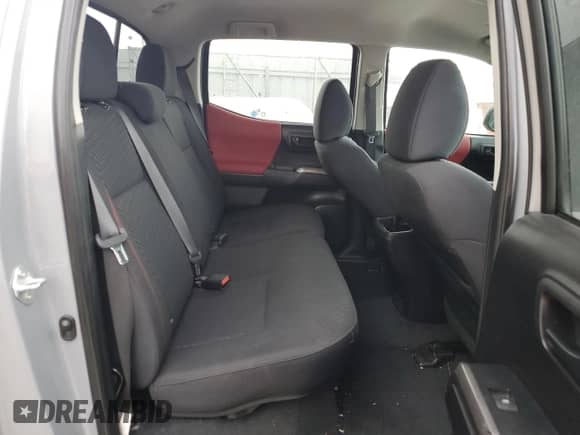 2021 Toyota Tacoma TRD Off Road with VIN 3TMCZ5AN5MM429356, listed as a Copart auction lot 71444135 with 68,728 mi miles and Salvage title. Bid and sale history available at DreamBid. Image 10.