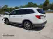 2020 Honda Pilot Touring 7-Passenger с VIN 5FNYF5H60LB012291, выставлен на аукционе Copart как лот 56669745 с пробегом 93 334 миль миль и Списание • Salvage title. История ставок и продаж доступна на DreamBid. Изображение 2.