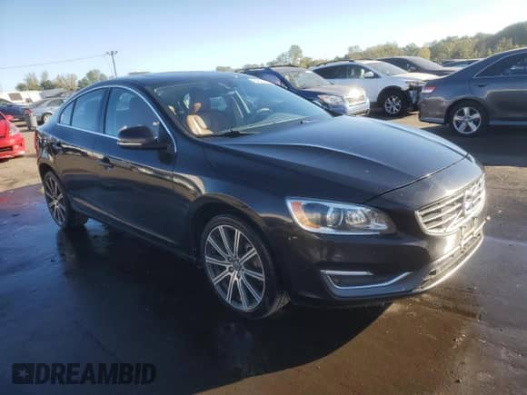 2014 Volvo S60 T5 с VIN YV1612FS8E2285256, выставлен на аукционе Copart как лот 84628425 с пробегом 167 801 миль миль и Списание • Salvage title. История ставок и продаж доступна на DreamBid. Изображение 4.