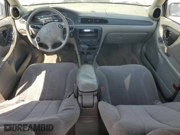 2005 Chevrolet Malibu Classic z VIN 1G1ND52FX5M113794, wystawiony jako Copart lot #65444925 z przebiegiem 84 887 mil mil oraz Szkoda całkowita • Salvage title. Historia ofert i sprzedaży dostępna na DreamBid. Obrazek 8.