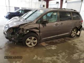 2012 Toyota Sienna LE AAS with VIN 5TDKK3DC8CS256316, listed as a Copart auction lot 66836725 with 238,189 mi miles and Salvage title. Bid and sale history available at DreamBid. Image 1.