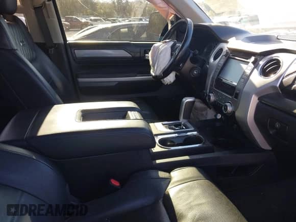 2017 Toyota Tundra Platinum with VIN 5TFAY5F10HX597924, listed as a IAAI auction lot 41169888 with 117,593 mi miles and . Bid and sale history available at DreamBid. Image 5.