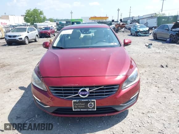 2016 Volvo S60 T5 Drive-E Premier z VIN YV126MFK4G2399463, wystawiony jako IAAI lot #42568556 z przebiegiem 94 972 mil mil oraz . Historia ofert i sprzedaży dostępna na DreamBid. Obrazek 11.