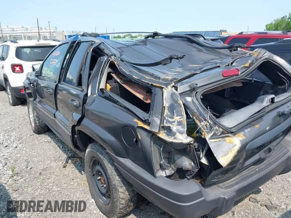 2004 Jeep Grand Cherokee Laredo z VIN 1J4GW48S04C338331, wystawiony jako IAAI lot #42392612 z przebiegiem Nie podano mil oraz . Historia ofert i sprzedaży dostępna na DreamBid. Obrazek 14.