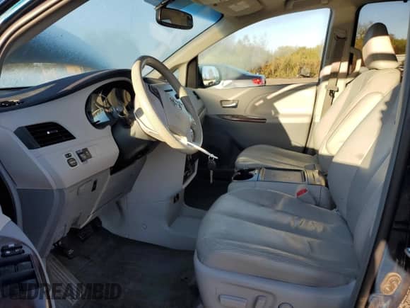 2012 Toyota Sienna XLE with VIN 5TDYK3DC5CS245235, listed as a Copart auction lot 82349425 with 149,275 mi miles and Salvage title. Bid and sale history available at DreamBid. Image 7.