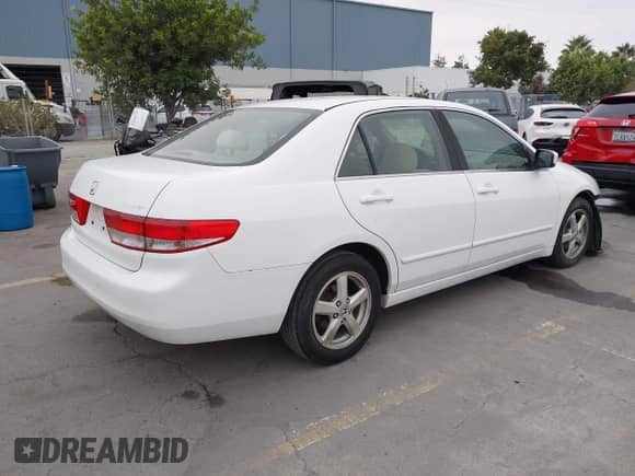 2004 Honda Accord EX with VIN JHMCM56684C028240, listed as a IAAI auction lot 43518508 with 312,455 mi miles and . Bid and sale history available at DreamBid. Image 4.