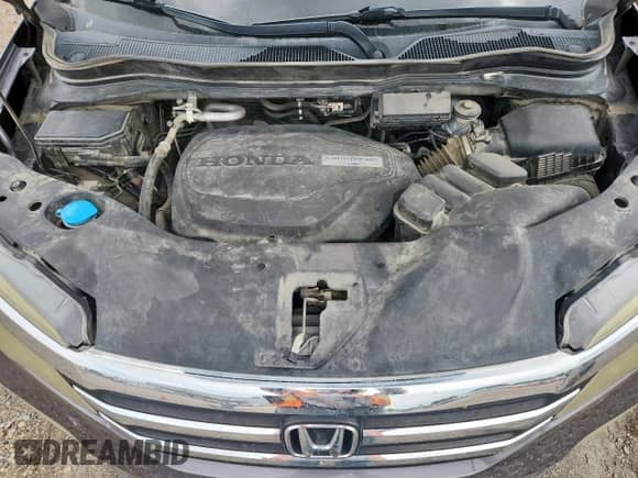 2017 Honda Pilot EX-L with VIN 5FNYF5H88HB013682, listed as a Copart auction lot 59129175 with 169,461 mi miles and Salvage title. Bid and sale history available at DreamBid. Image 12.