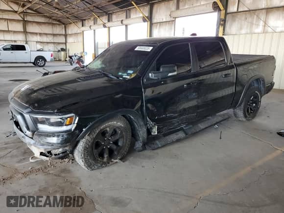 2020 Ram 1500 Rebel z VIN 1C6SRFLT0LN265734, wystawiony jako Copart lot #58668035 z przebiegiem 62 838 mil mil oraz Szkoda całkowita • Salvage title. Historia ofert i sprzedaży dostępna na DreamBid. Obrazek 1.