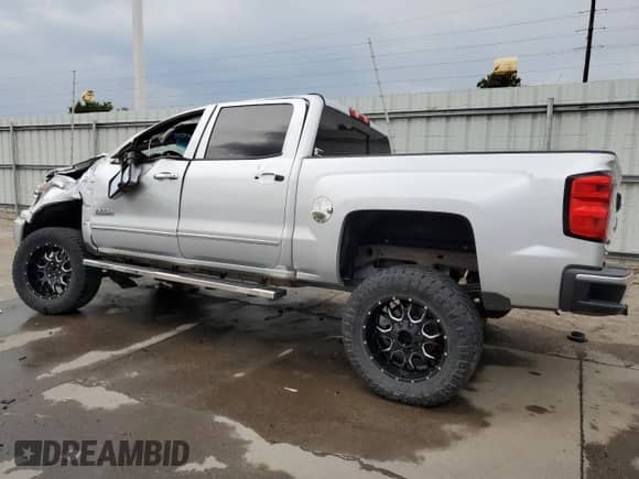 2014 Chevrolet Silverado 1500 High Country с VIN 3GCUKTEJ5EG294206, выставлен на аукционе Copart как лот 65223125 с пробегом 187 787 миль миль и Списание • Salvage title. История ставок и продаж доступна на DreamBid. Изображение 2.