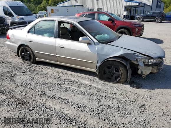 1998 Honda Accord EX with VIN 1HGCG1657WA027542, listed as a Copart auction lot 71193074 with 223,064 mi miles and Salvage title. Bid and sale history available at DreamBid. Image 4.
