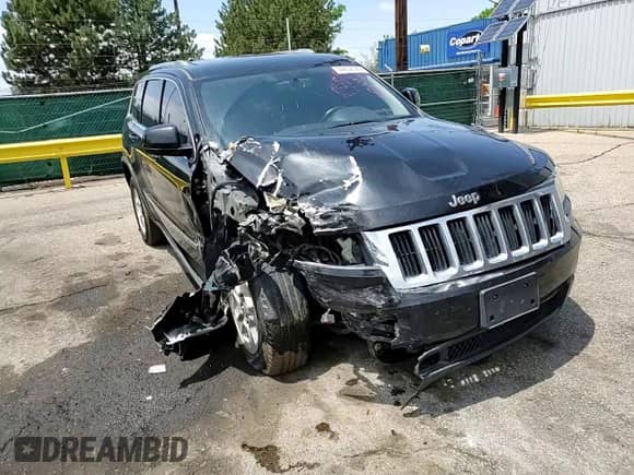 2012 Jeep Grand Cherokee Laredo с VIN 1C4RJEAT6CC301188, выставлен на аукционе Copart как лот 59602325 с пробегом 163 126 миль миль и Списание • Salvage title. История ставок и продаж доступна на DreamBid. Изображение 11.