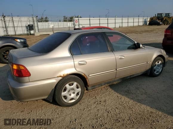 2000 Honda Civic z VIN 2HGEJ6680YH913529, wystawiony jako Copart lot #80510325 z przebiegiem 185 979 mil mil oraz Szkoda całkowita • Salvage title. Historia ofert i sprzedaży dostępna na DreamBid. Obrazek 3.