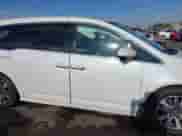 2015 Honda Odyssey Touring Elite с VIN 5FNRL5H94FB052272, выставлен на аукционе IAAI как лот 43040692 с пробегом 134 921 миль миль и . История ставок и продаж доступна на DreamBid. Изображение 14.