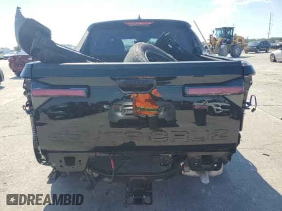 2022 Hyundai Santa Cruz SE с VIN 5NTJA4AE4NH039558, выставлен на аукционе Copart как лот 74379164 с пробегом 18 324 миль миль и Списание • Salvage title. История ставок и продаж доступна на DreamBid. Изображение 6.