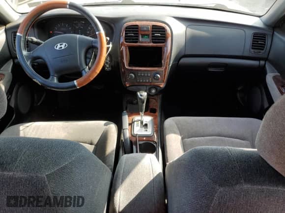 2004 Hyundai Sonata GLS z VIN KMHWF35H64A952215, wystawiony jako Copart lot #76305144 z przebiegiem 125 166 mil mil oraz Szkoda całkowita • Salvage title. Historia ofert i sprzedaży dostępna na DreamBid. Obrazek 8.