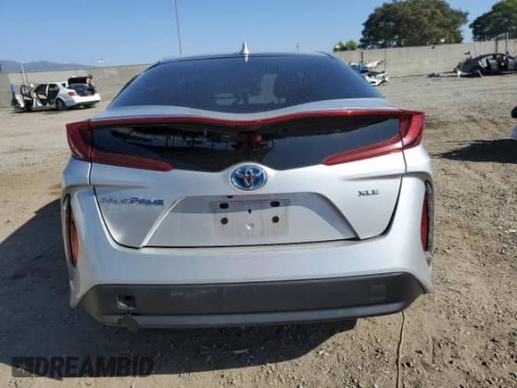 2022 Toyota Prius XLE with VIN JTDKAMFP6N3205877, listed as a Copart auction lot 87436815 with 34,381 mi miles and Salvage title. Bid and sale history available at DreamBid. Image 6.