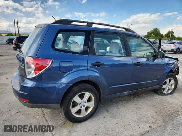 2013 Subaru Forester X z VIN JF2SHABC1DH415805, wystawiony jako Copart lot #81409345 z przebiegiem 118 654 mil mil oraz Szkoda całkowita • Salvage title. Historia ofert i sprzedaży dostępna na DreamBid. Obrazek 3.