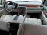 2009 Chevrolet Suburban 2LT с VIN 1GNFK263X9J105175, выставлен на аукционе Copart как лот 83761685 с пробегом 229 787 миль миль и Списание • Salvage title. История ставок и продаж доступна на DreamBid. Изображение 8.